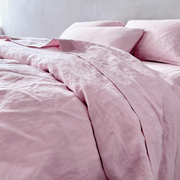 Side View Of Lavender Pink Linen Duvet Cover On Bed - linenshed