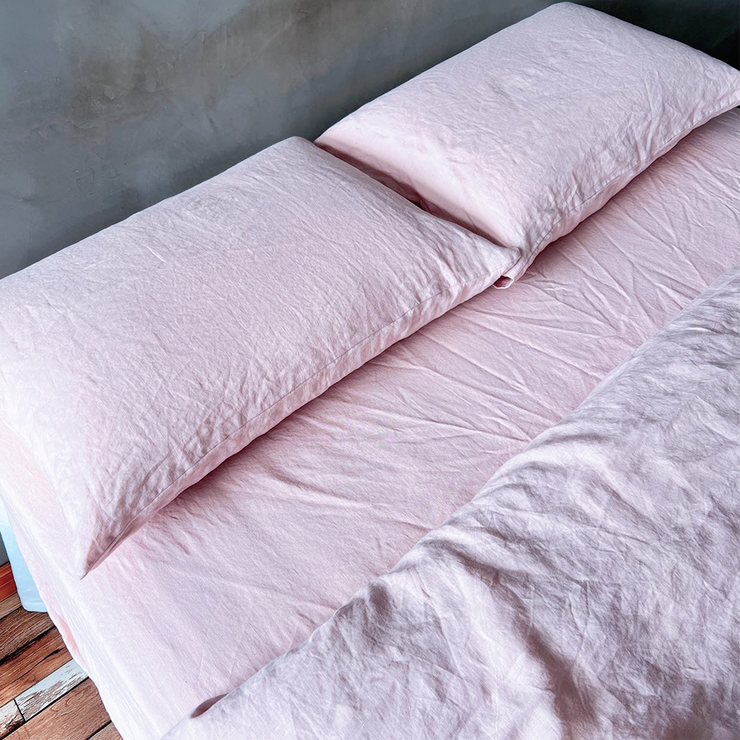 Set of 2 Housewife Pillowcases Lavender Pink On Bed - Linenshed
