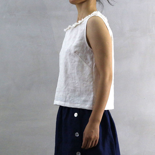 Buy this beautifully frayed ruffle collar tank today!